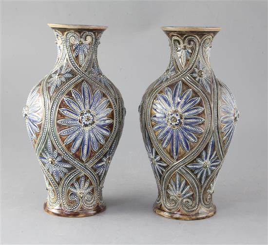 A pair of Doulton Lambeth baluster vases, decorated by Frank Butler, 27.5cm
